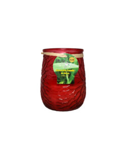 Citronella candle in red glass jar