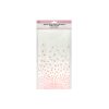 white table cover with pink polka dots