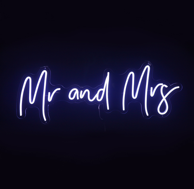 blue neon sign mr and mrs